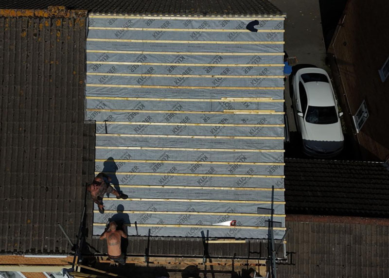 Installing solar panels on a home in Purbrook